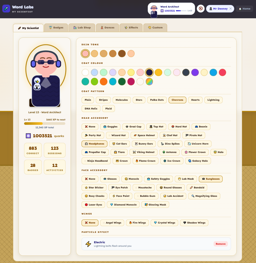 The My Scientist customisation page showing a dressed-up scientist character, badges, quarks balance, and a shop grid of purchasable items.